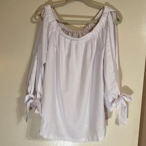 White top with open arms